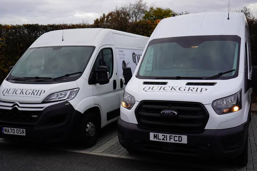 Two branded QuickGrip vans ready to dispatch